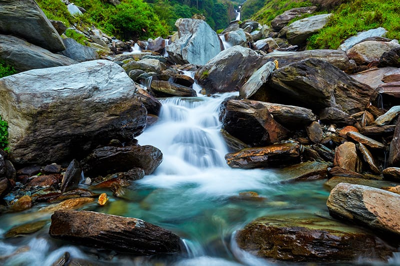 waterfall on mossy rocks