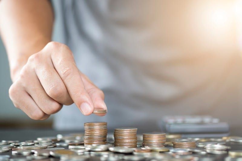 Man counting coins