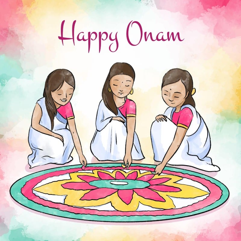 Girls painting Rangoli on the day of Onam